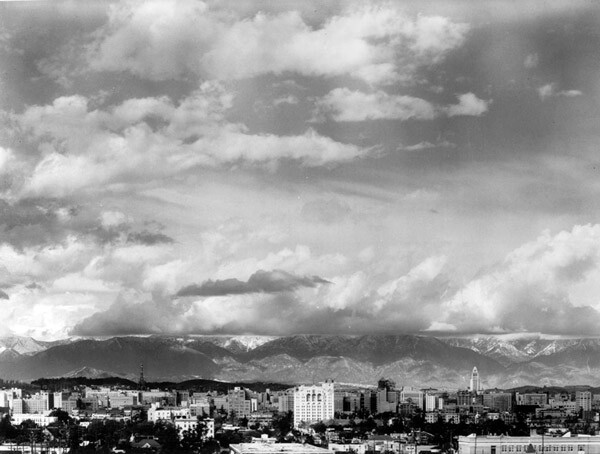 Before Los Angeles repealed its building height limit in 1956, flatness prevailed in the city's skyline. Circa 1940 photograph courtesy of the Dick Whittington Photography Collection, USC Libraries.