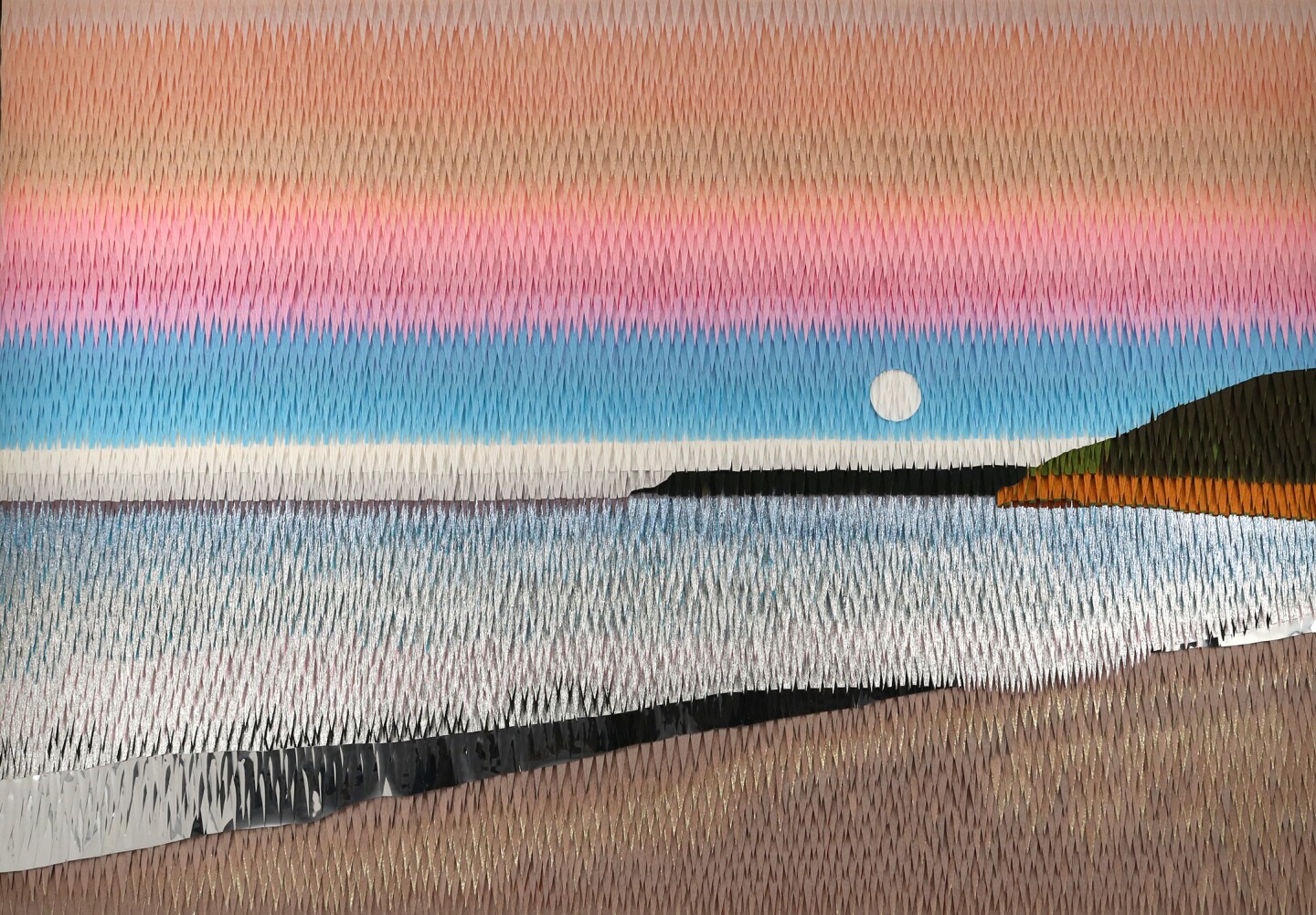 Crepe papers are laid over one another depicting a beach landscape with the moon rising as the sun is setting.