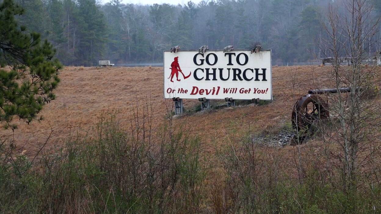 Road sign in rural Alabama. | Reel South