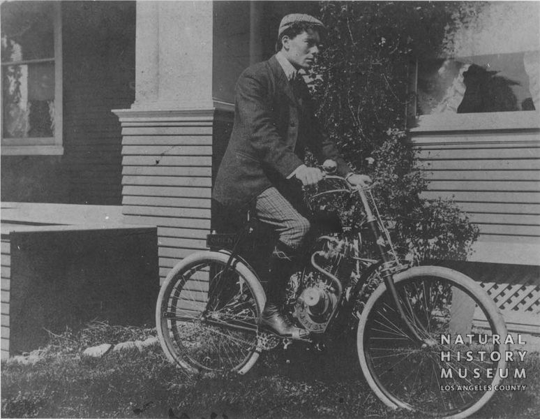 Hamlin on his "Orient" Motorcycle around 1901. The bike was the first motorcycle west of the Rockies. Natural History Museum of Los Angeles County, P-115 Ralph Hamlin Collection