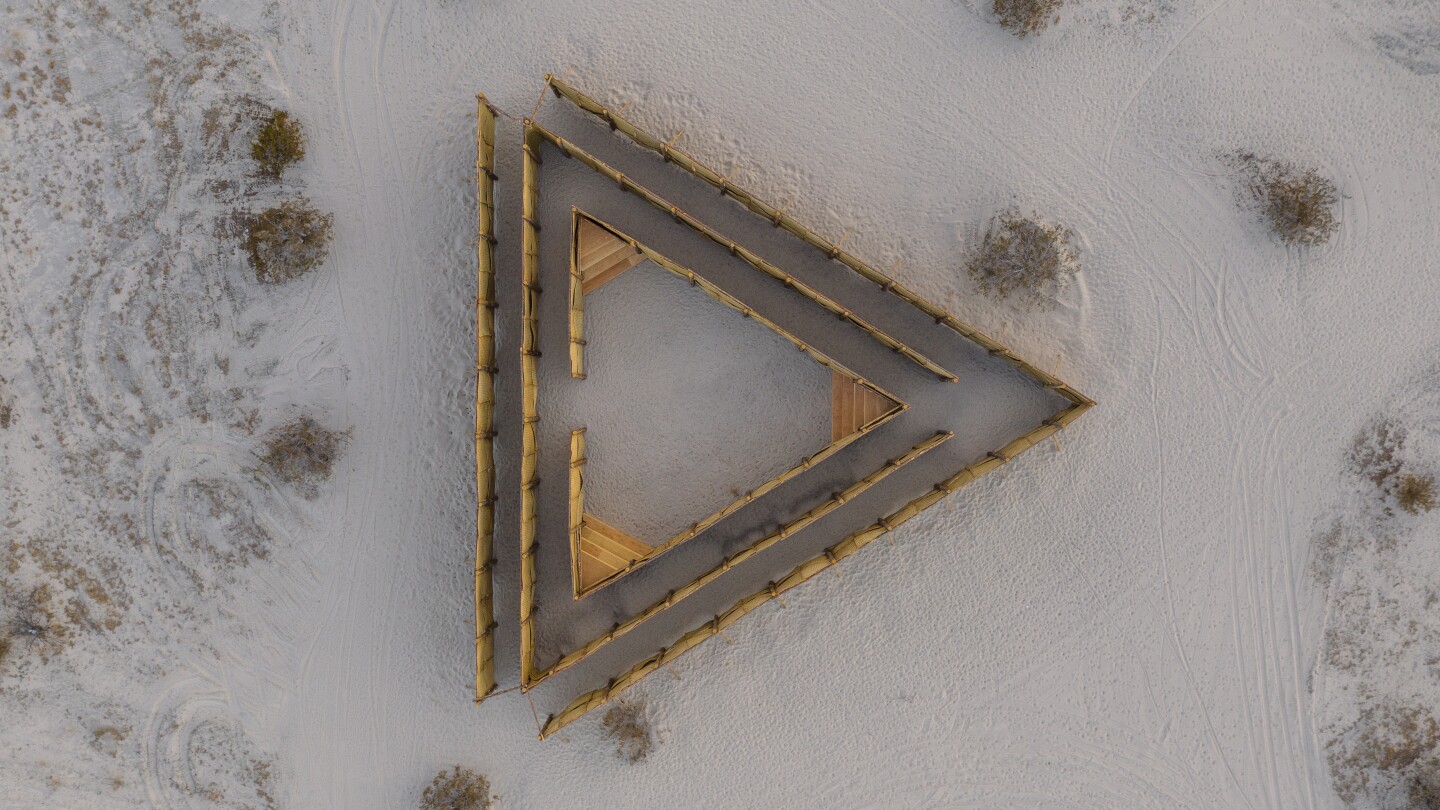 A triangular maze made out of Mexican petate created by Eduardo Sarabia is part of the Desert X 2021 exhibition.