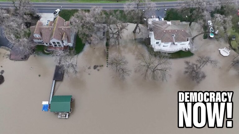 A top down view of severe flooding near residential homes.