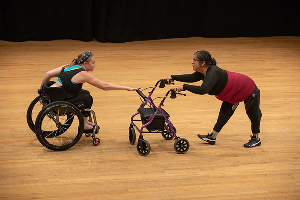 Harmanie Taylor, left, and Vanessa Cruz perform a duet during the Dancing Disability Lab at UCLA. | Reed Hutchinson/UCLA.