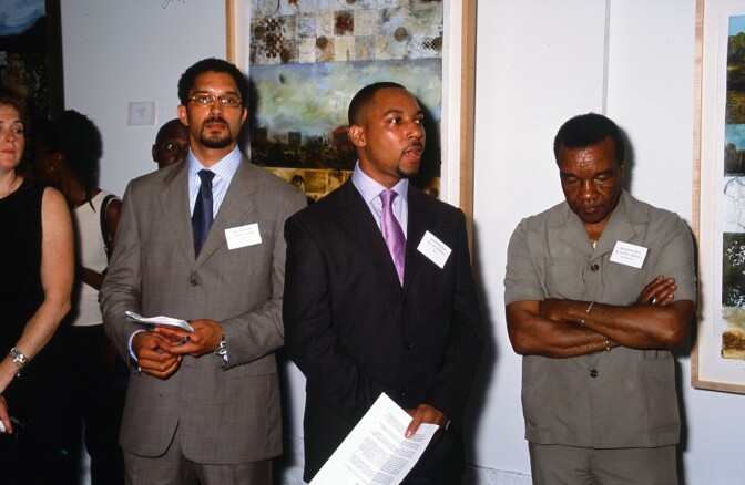 Terrell Tilford (left) and Melvin Marshall (right) during the first show they co-curated together June 1999. On the far right is their mentor Dr. David C. Driskell (June 7, 1931-April 1, 2020). | Courtesy of Melvin Marshall