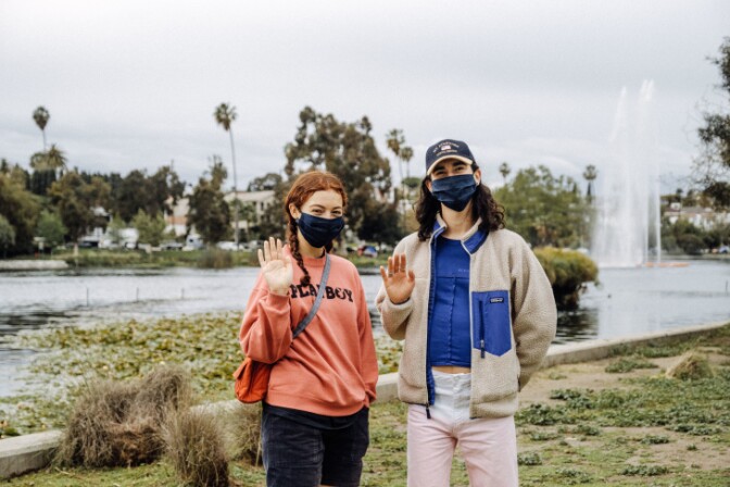 Smizing and waving are the go-to greetings these days for Adrienne Sacks and Mackenzie Katz, but for the most part they try to steer clear of people. | Chava Sanchez/LAist