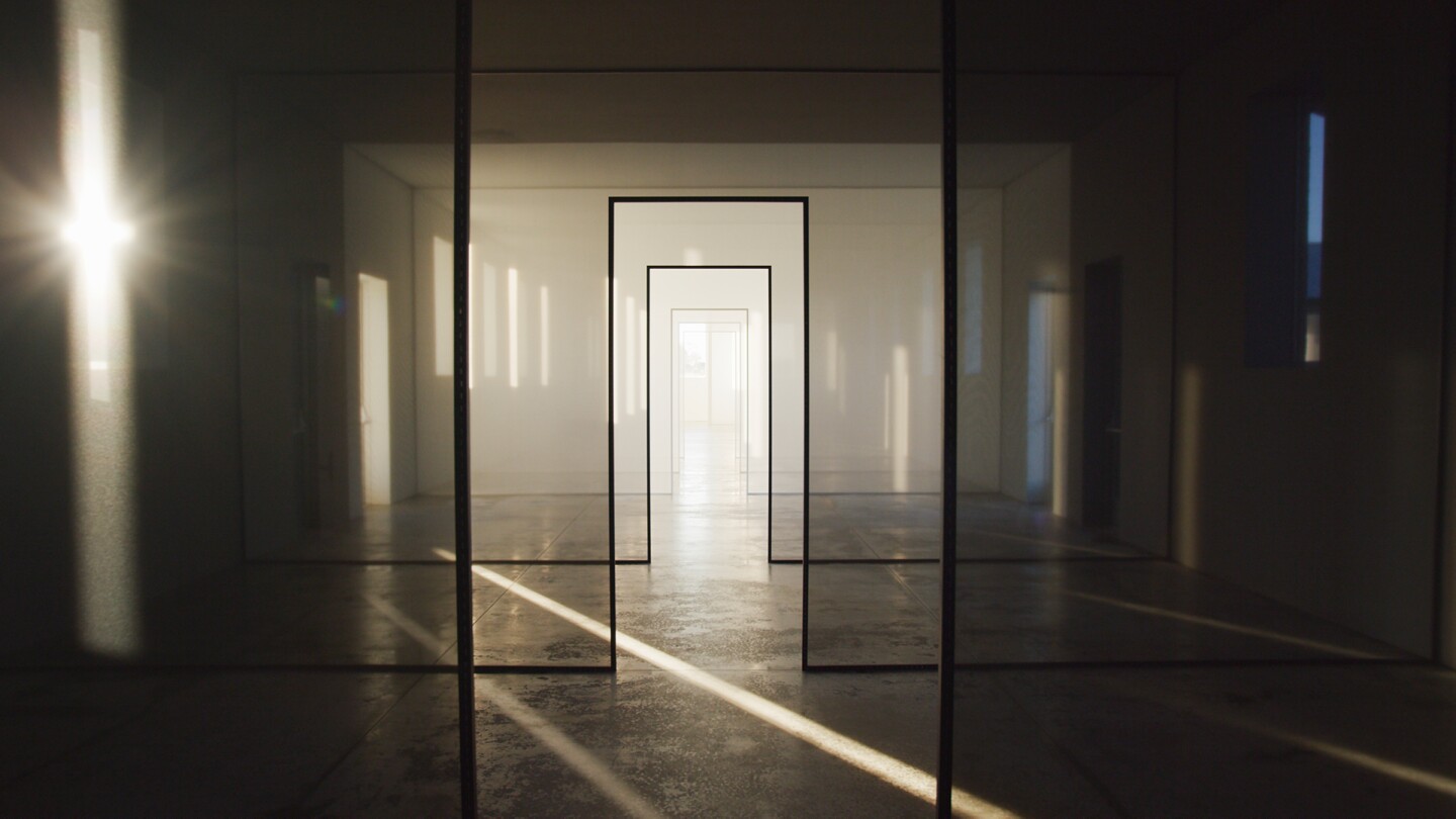 Light shimmers through a scrim showing through Robert Irwin's 'Dawn to Dusk,' 2016 at Chinati Foundation | Still from "Light & Space" ab s11