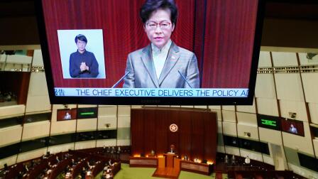 News Wrap: Hong Kong's leader says new law brings stability