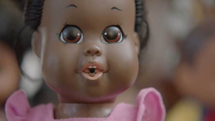 The Baby Nancy doll produced by Shindana Toys. This doll is now in Billie Green's collection. | Still from "Lost LA" Shindana Toys