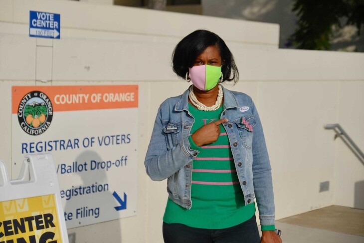 Darice Goodwin from Santa Ana casts her ballot at the Orange County Registrar on Nov. 3, 2020. | Chava Sanchez/LAist