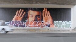 Days after being restored, Kent Twitchell's mural was marked | Photo via Mural Conservancy of Los Angeles