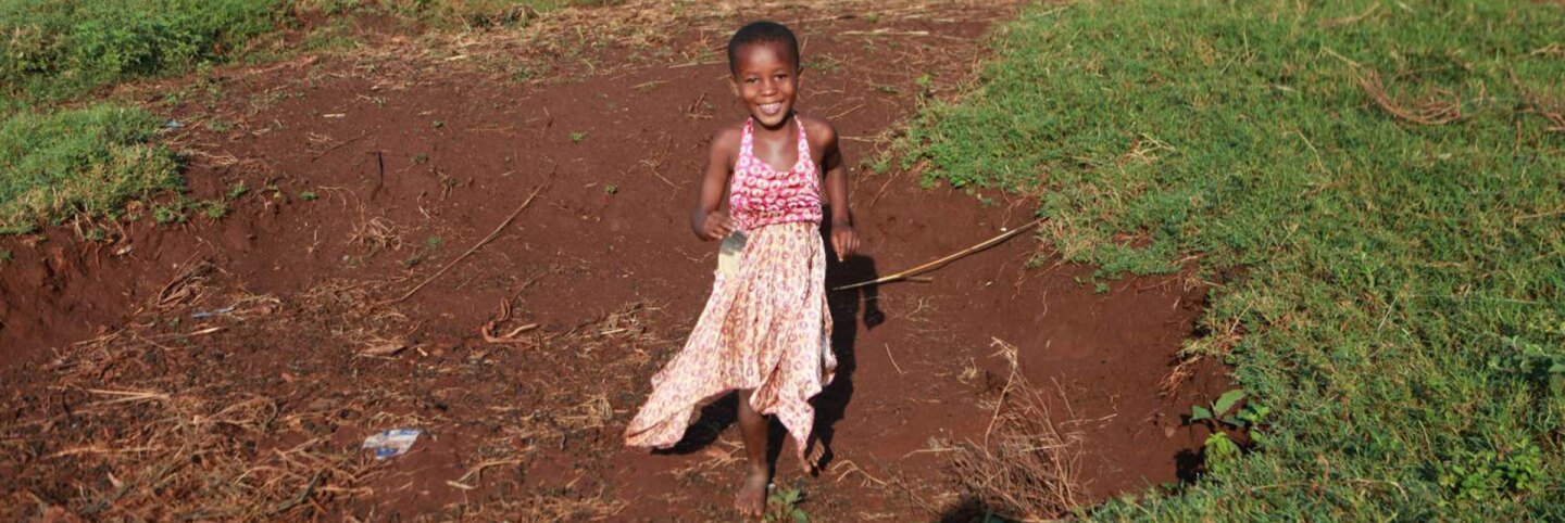 Child playing in Bukaleba Forest Reserve, Uganda