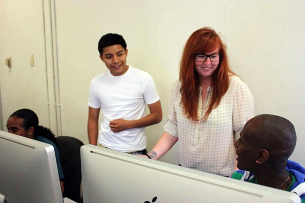 Colocation America VP of Online Strategies Samantha Walters talks to student Jose Sandoval and client Robert Hubbard | Photo: J. Morr