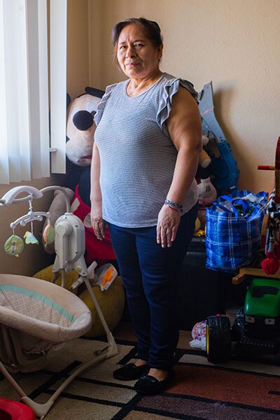 Maria Reyes Zavala of Fresno babysits children for mothers who work in the farm fields. | Carlos Castro