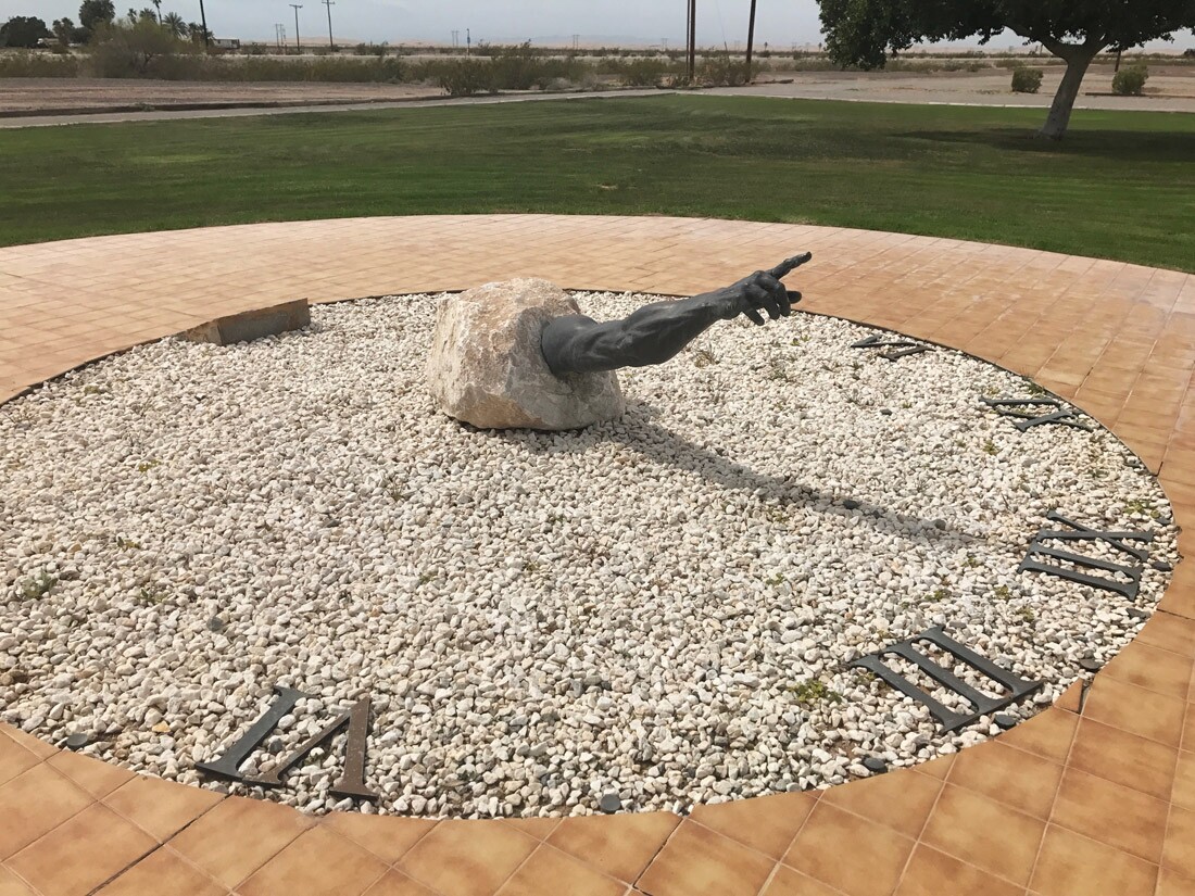 Sundial with 3-D replica of Michelangelo's arm of God, Felicity | Brant Barger