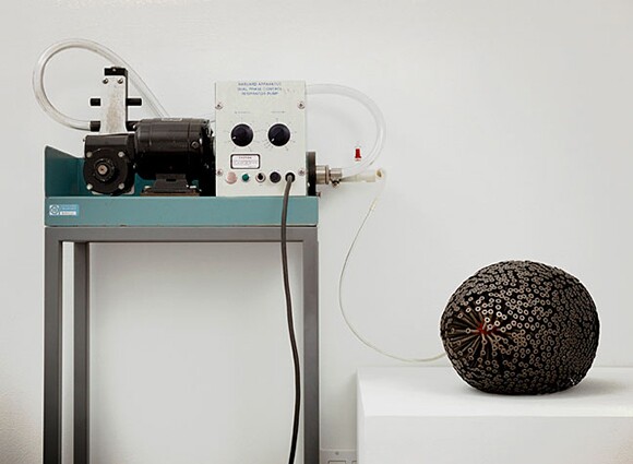 "Pump," 2006, Football, Drywall Screws, Animal Respirator