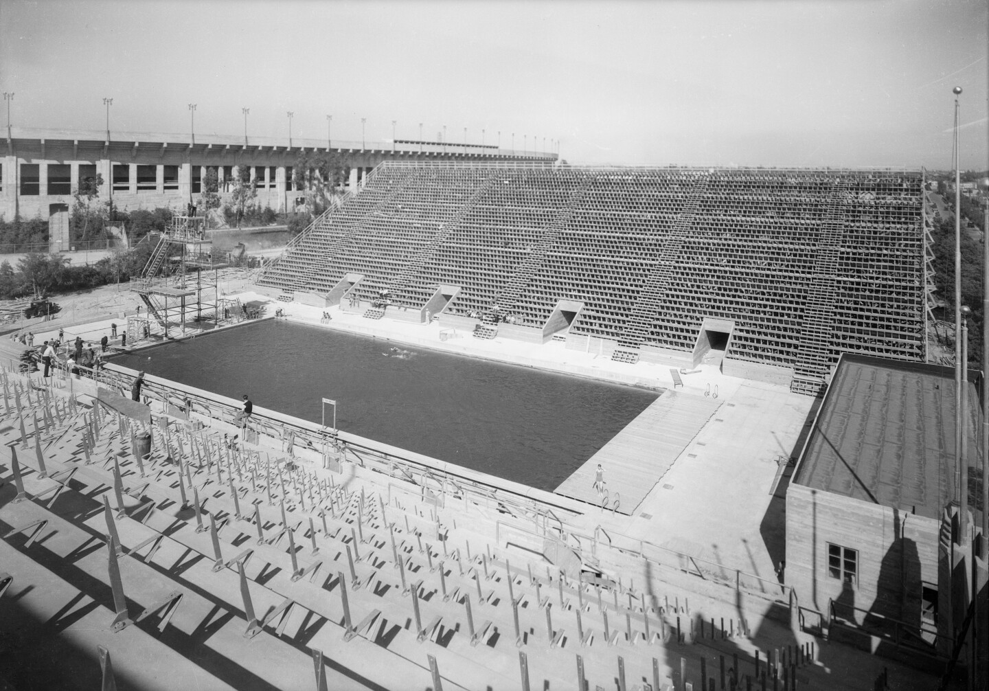 An Olympic pool photographed with empty stands
