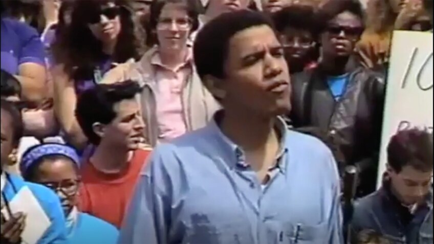 A young Barack Obama introduces Professor Derrick Bell at a 1991 rally advocating for diversity at Harvard Law School