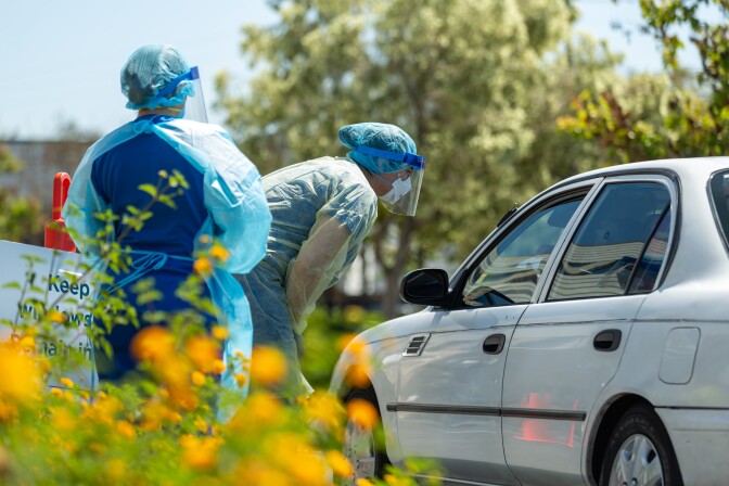 Health workers at a COVID-19 testing site in Anaheim. | Courtesy of Altamed