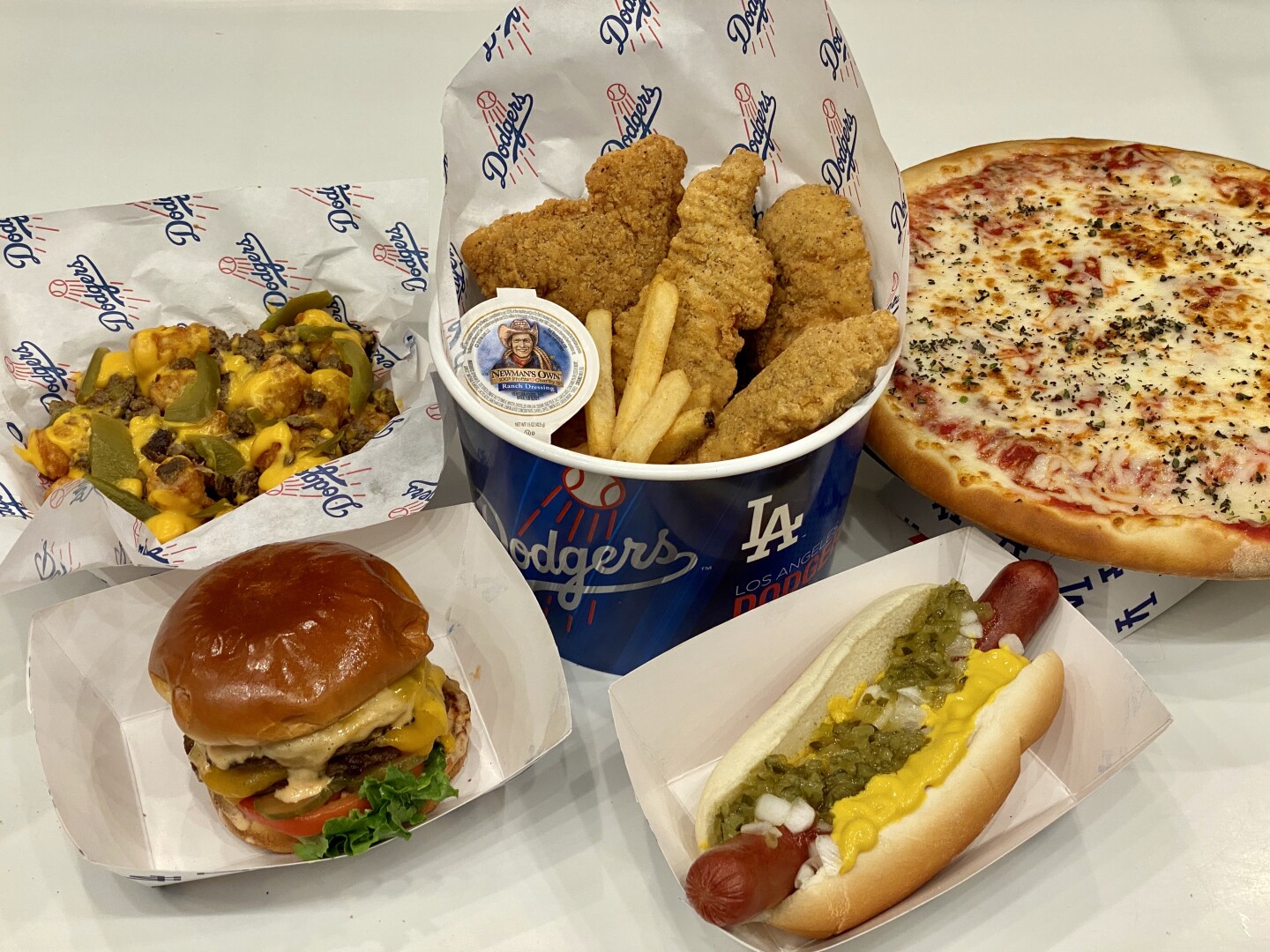 The food selection options from Home Plates include the hotdogs, pizza, chicken tenders are more | Courtesy of Home Plates