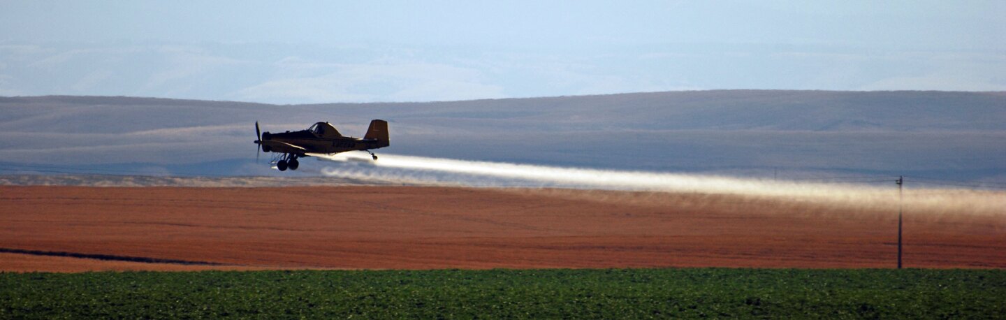 A crop duster at work | Photo: Scott Butner, some rights reserved