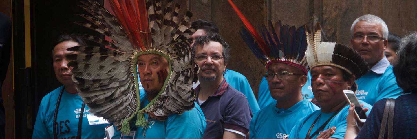 Indigenous people, fishermen, and climate activists protest during an oil and gas auction in Rio de Janeiro, Brazil, in 2017. | Juliana Colussi / Creative Commons