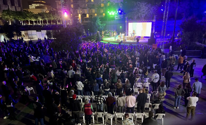 Overhead crowd shot at an outdoor concert.