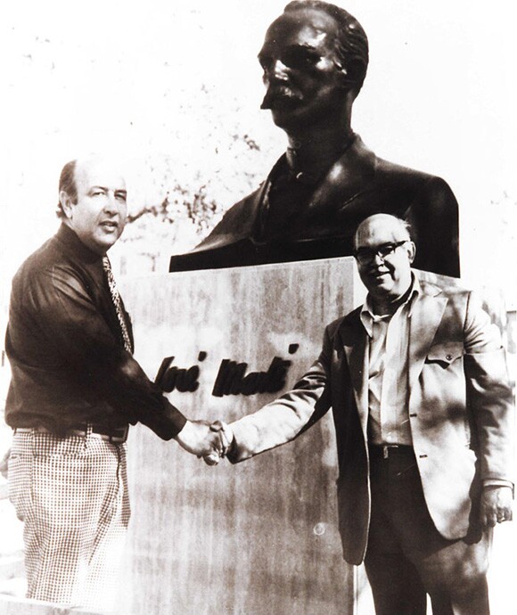 Civil engineer Carlos Sebastian Lorente, and Sergio López-Mesa installing José Martà Monument, 1976. | Cuban California Archive USC Libraries Special Collections.