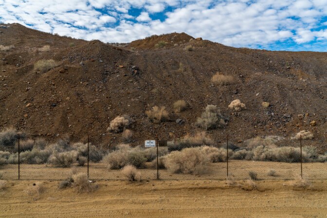 A small section of RMC’s spent heap leach pad. Notice how the mountain of ore has been graded to appear more natural. | Kim Stringfellow.