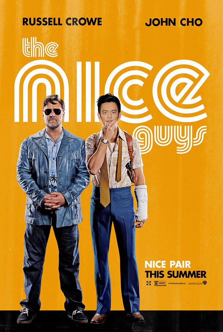 Movie poster featuring two men standing next to each other, one White and one Asian American, both in 1970s clothing.