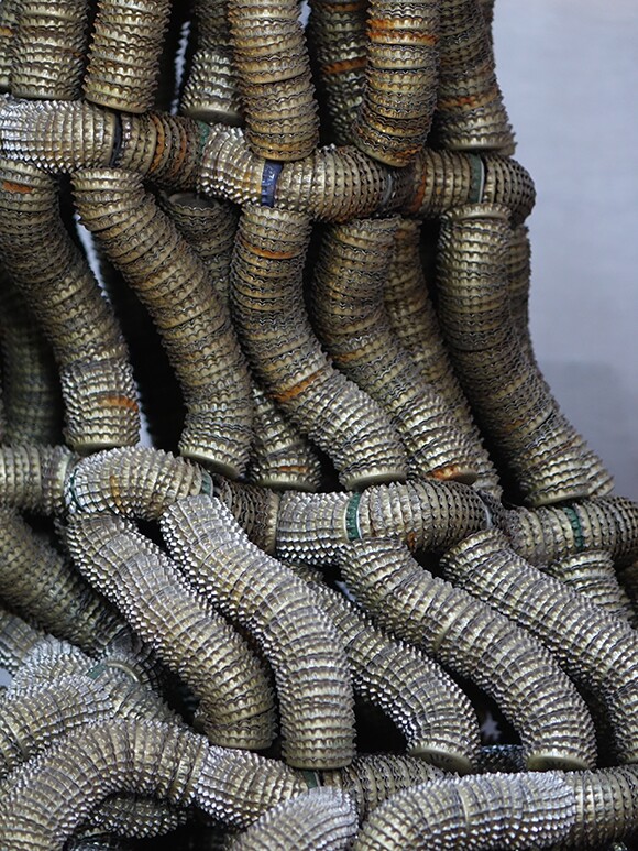 "Bottle Cap Sculpture" (unused bottle caps, metal wire), 1992. | Photo: Kim Kralj