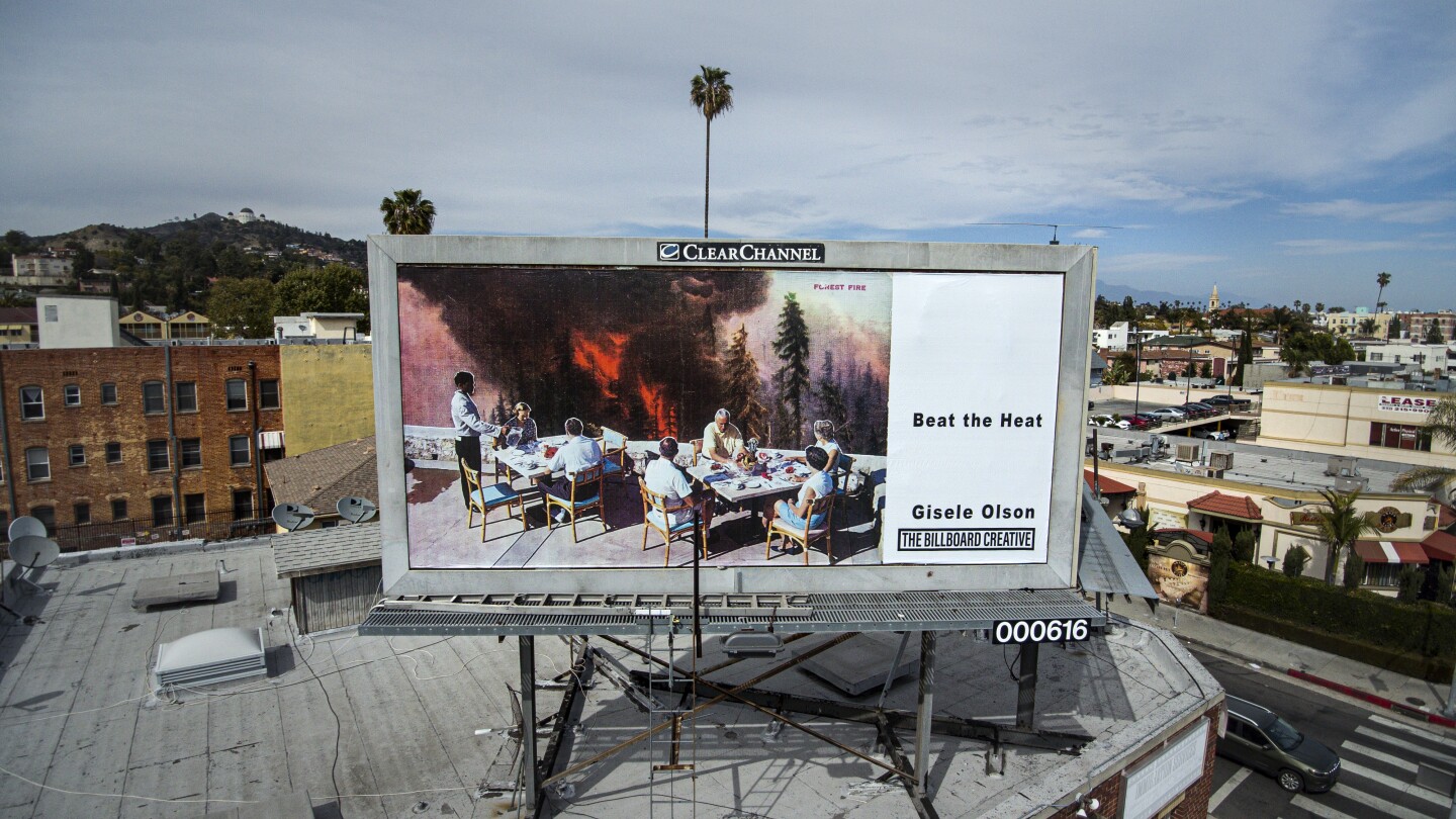 Artist Gisele Olson's billboard located near the intersection of Hollywood Blvd. and Normandie Ave. alters vintage postcards to create new narratives that dismantle the materials’ nostalgic, comfortable perception of the U.S., using collage to critique and reinterpret America’s idyllic self-image.
