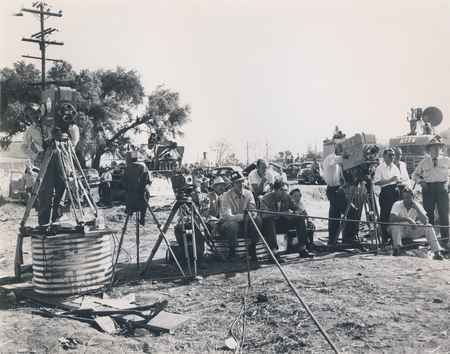 KTTV and KTLA news teams show up at the well site to film the rescue attempt of Kathy Fiscus.