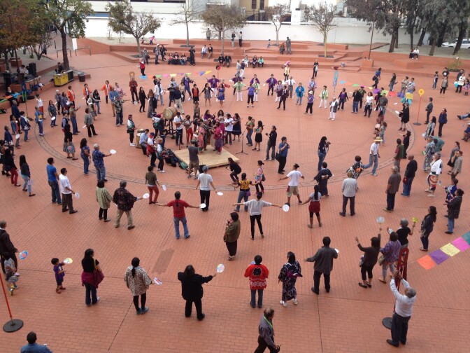 People gather in circles for the FandangObon Festival at the Japanese American Cultural and Community Center.