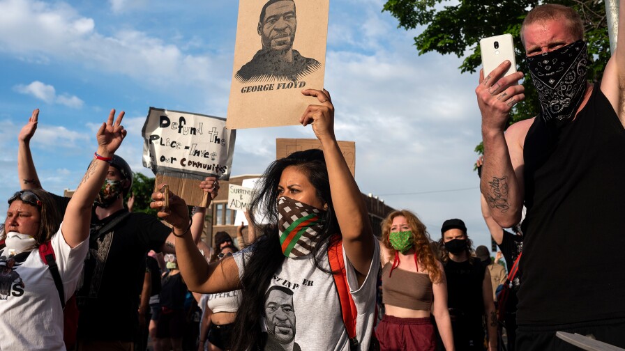 Protesters confront police outside the 3rd Police Precinct on May 27, 2020 in Minneapolis, Minnesota after the George Floyd killing | Stephen Maturen/Getty Images