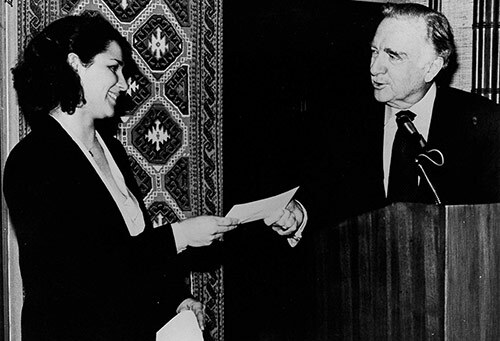 Val Zavala receives her first award from Walter Cronkite.