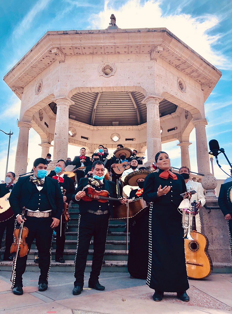 A mariachi group poses before a performance at Mariachi Plaza in Boyle Heights to fundraise for the mariachi relief fund. | Courtesy of Community Power Collective