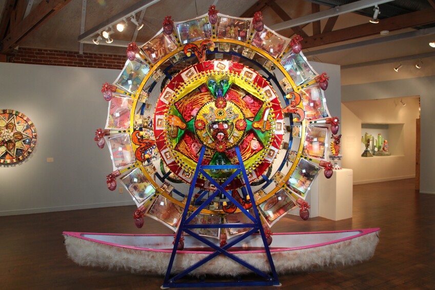 "La Belle Epoch" depicts the heyday of the Aztecs as its timepiece. There are hearts going around the Ferris wheel, which have all been extricated. Surrounding them are clues to their demise.