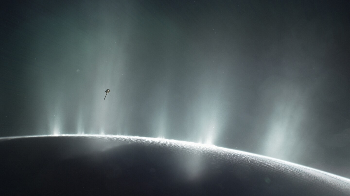 Artist's rendering shows Cassini diving through plume from Saturn's moon Enceladus.