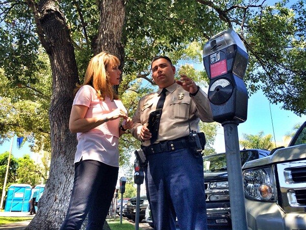 Jennifer Sabih speaks with LADOT Officer Enrique De La Cruz for a segment of KCET's 'SoCal Connected' | Photo: Zach Behrens/KCET