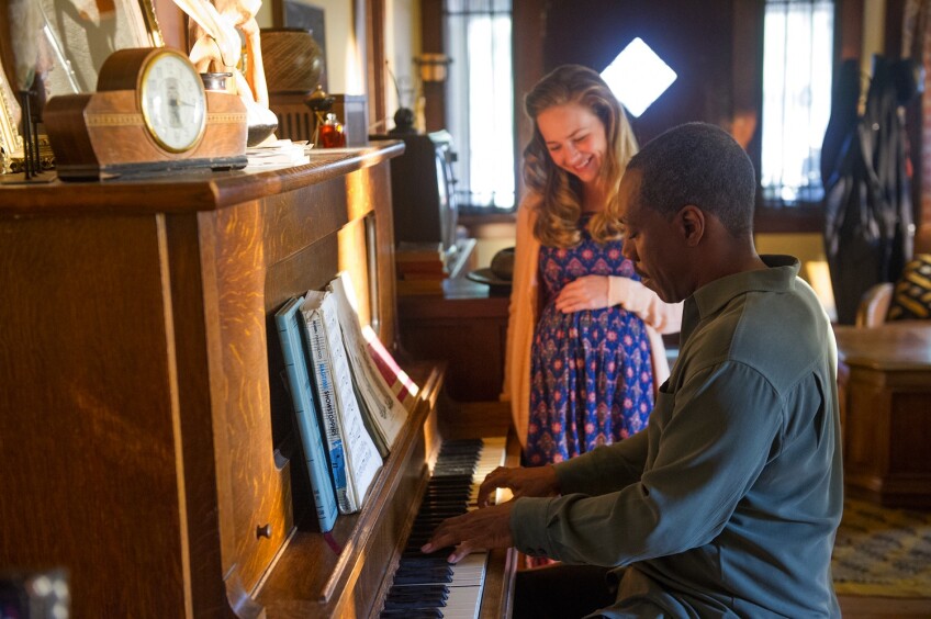 Eddie Murphy and Britt Robertson in "Mr. Church"