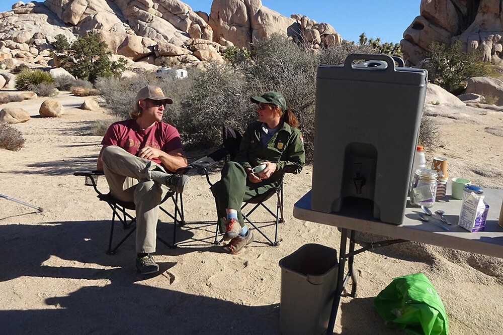 The JTNP climbing ranger Bernadette Regan (right) hosts Climber Coffee on Saturday and Sunday mornings at Hidden Valley Campground |Courtesy of JTNP