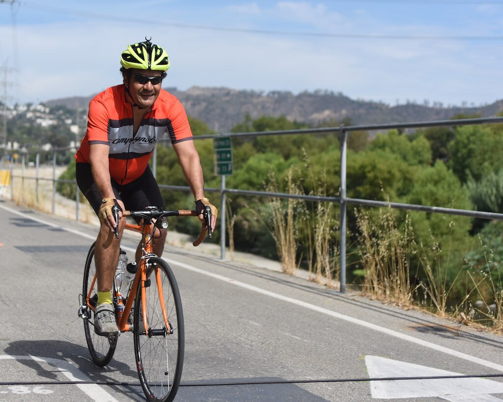 Robert García biking | García family / The City Project