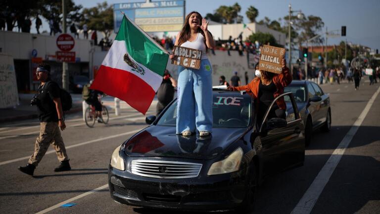 Troops deployed in LA as immigration raids stir protests