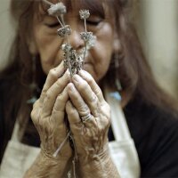 Barbara Drake holding sage