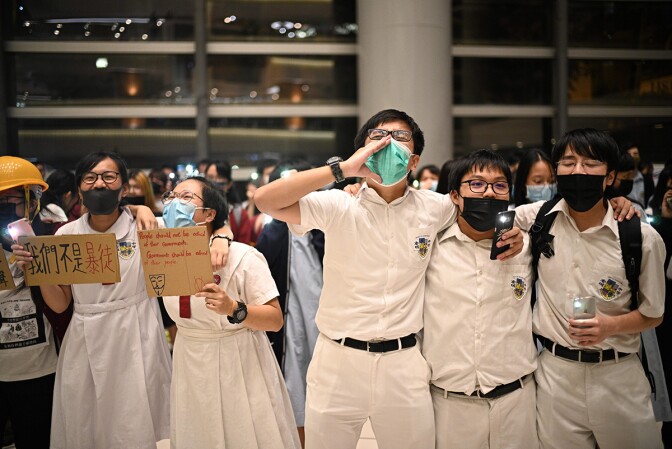 Students gather at a shopping mall in the Lok Fu area of Hong Kong on September 23, 2019, to sing a recently penned protest song titled 'Glory to Hong Kong' | Anthony WALLACE / AFP via Getty Images