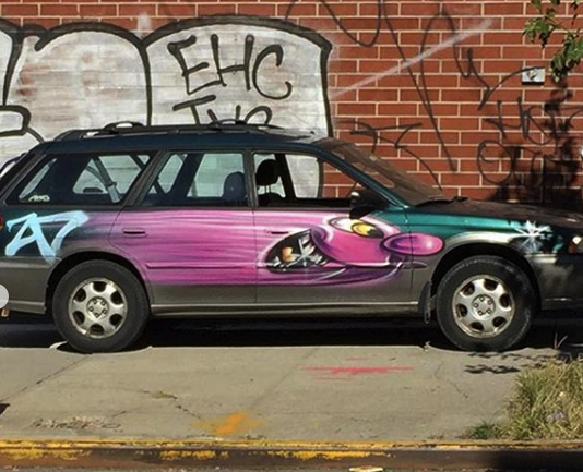 A green station wagon bombed by Kenny Scharf for his "Karbombz!" project | Courtesy of the artist