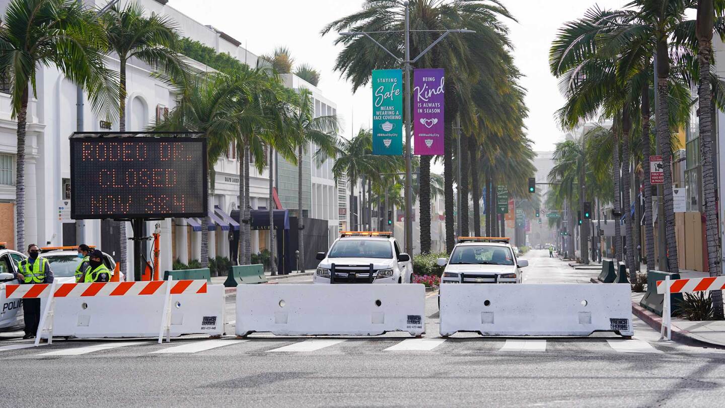 Rodeo Drive, the world renowned shopping street in Beverly Hills, California, is boarded up and closed to vehicular and pedestrian traffic on November 3, 2020 as a precaution against possible violence on the day of the U.S. presidential election.