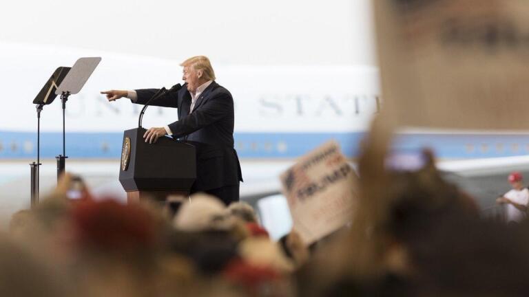Defiant Trump defends unsubstantiated claims of wiretapping