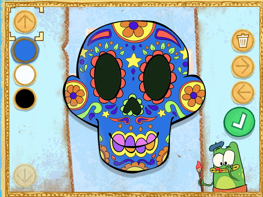 A colorful cartoon candy skull in the center with a cartoon green frog holding a paintbrush in the bottom right corner