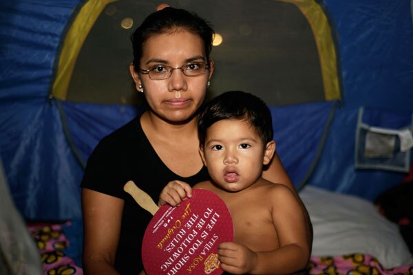 Entire families prepared to camp out throughout the day for much-needed healthcare. I Photo By: Ricardo Palavecino